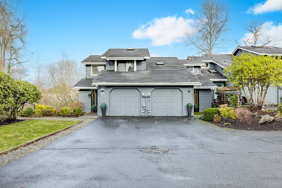 Unit 102 is on the right and there is a 1 car garage for storage.