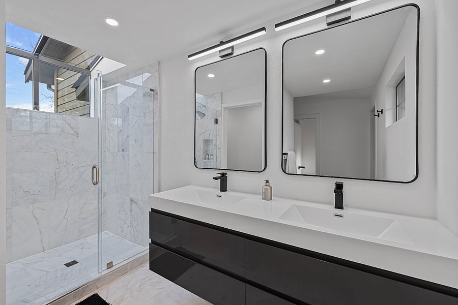 His & Hers sinks in the upper unit with drawers and blow dryer.