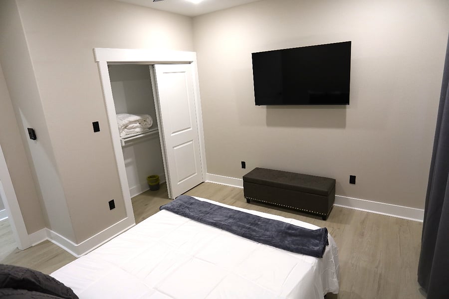 Bedroom #2 the Gray Escape Comfortable & Styled Bedroom 

Rest easy in a thoughtfully designed bedroom complete with nightstands and lamps, 