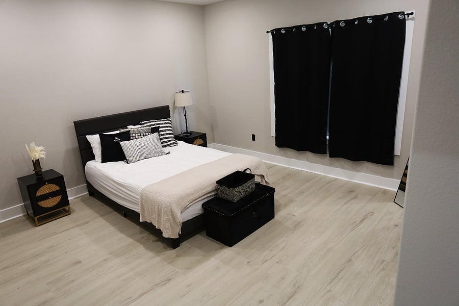 Bedroom #3 the Onyx Haven Comfortable & Styled Bedroom 

Rest easy in a thoughtfully designed bedroom complete with nightstands and lamps, 