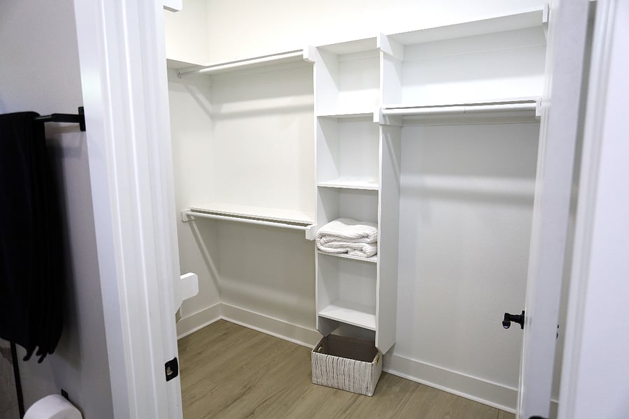 Spacious Walk-In Closet

A large walk-in closetall designed for comfort, convenience, and a touch of boho charm with extra pillows and blankets