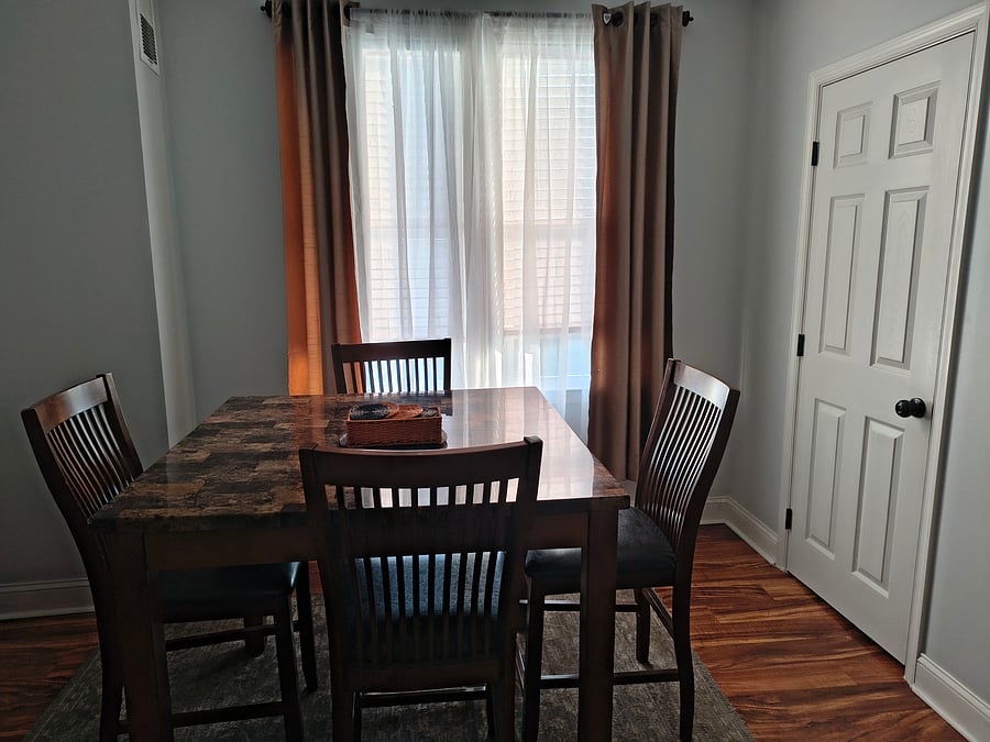 Dining room and door to half bath.
