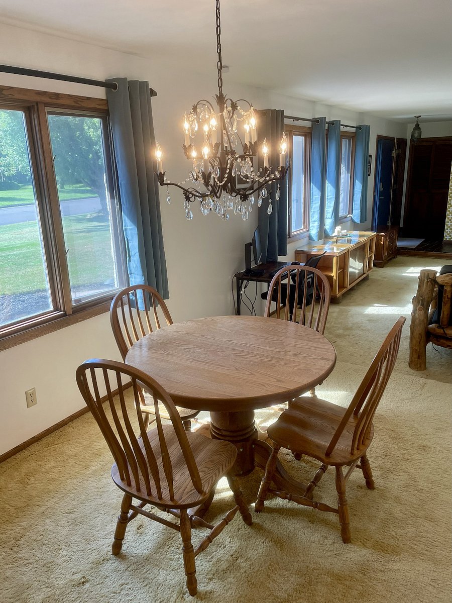 Dinning table leaf and extra chairs are available for use.