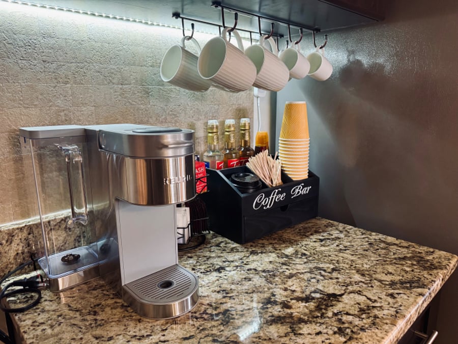 Coffee + tea station with starter items.