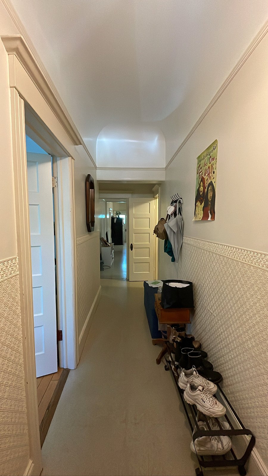 Entrance hallway and foyer feature the ottoman with storage.