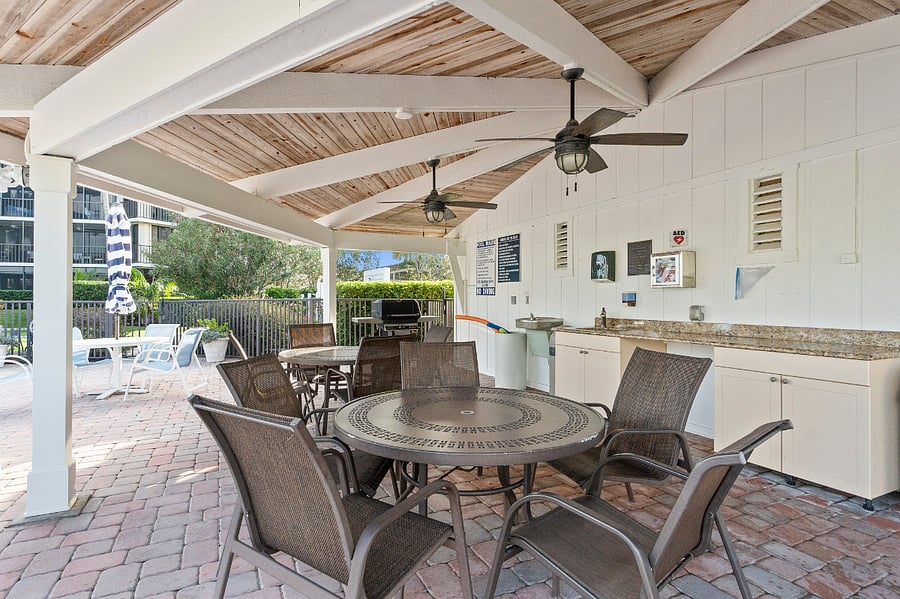 Grill and dining table for poolside BBQ