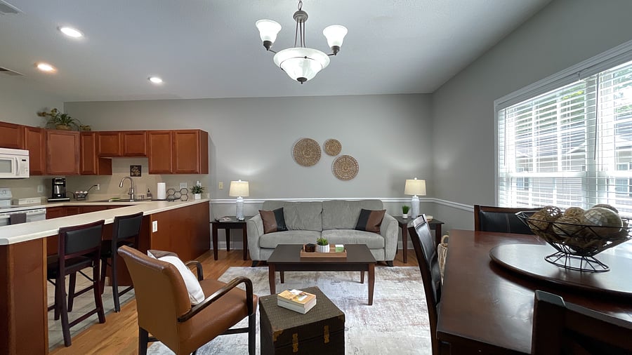 Relax in our spacious living room, featuring a comfy couch and stunning views that invite you to unwind!