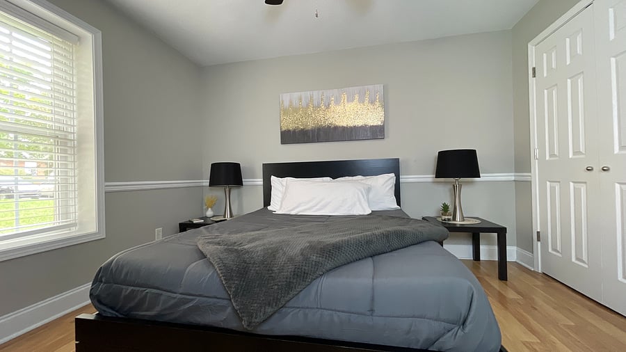 Experience luxury in our elegant queen-sized bedroom, designed for the perfect night's sleep!