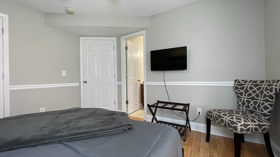 Stay entertained in our inviting room, complete with a chair for relaxation and a TV for your viewing pleasure