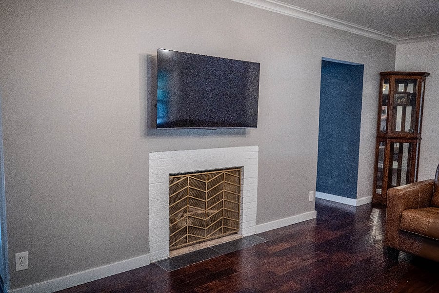 First living room with TV and cozy large sectional for relaxation and unwinding.