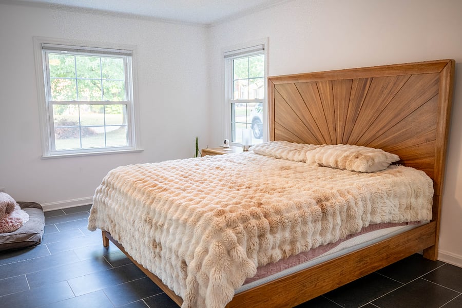 Main bedroom, king memory foam mattress, faux rabbit fur comforter.