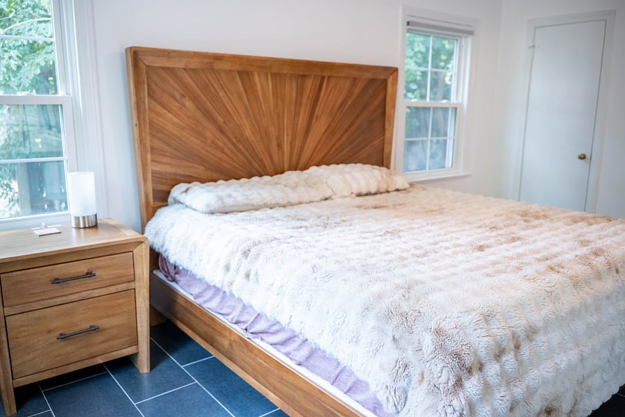 Main bedroom, king memory foam mattress, faux rabbit fur comforter.