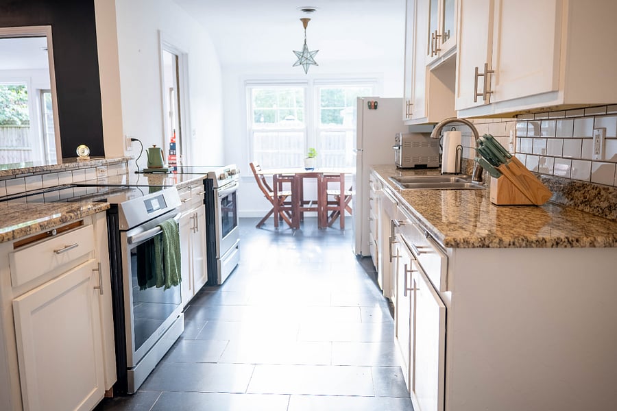 Full kitchen with tea kettle, induction stove, bread maker, blender, etc.