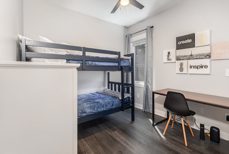 Bunkbeds, large dedicated work-space, full-sized closet