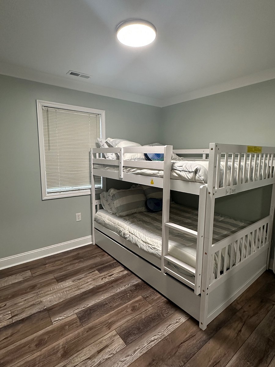 The second bedroom features a double full bunk bed. 