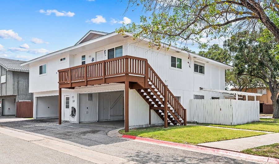 front of unit and balcony over looks duck pond