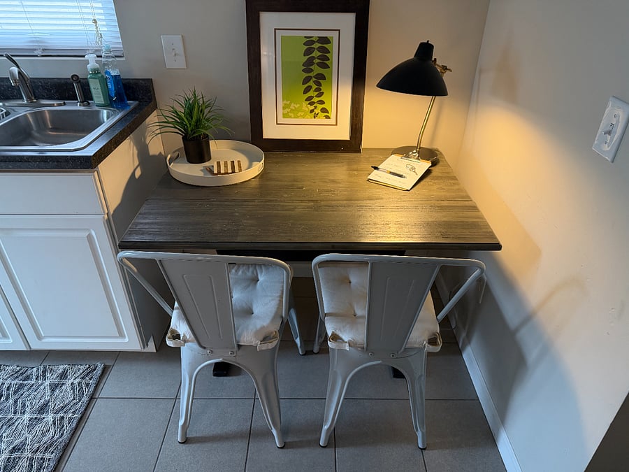Dining table/work space, in corner of kitchen, fold-out table extends