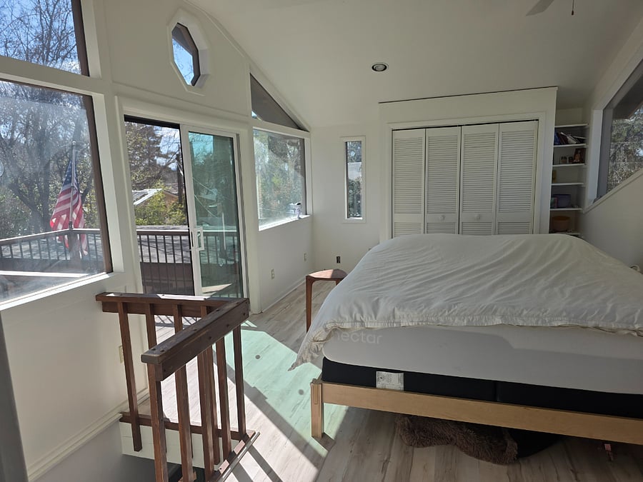 Bedroom 1 is located upstairs with king memory foam mattress, private balcony closet and newly remodeled bath with walk in shower