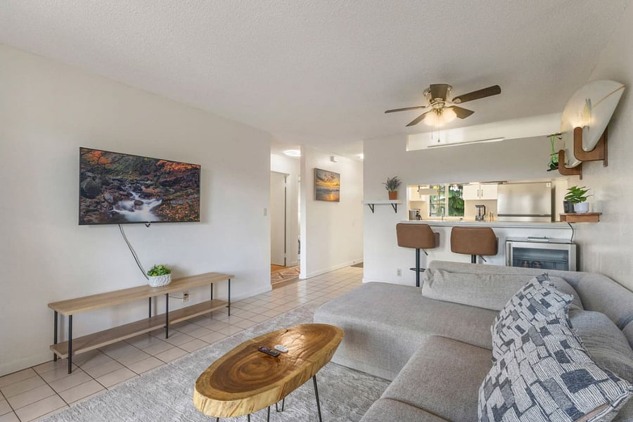 Whether youre watching natures beauty on-screen, catching up at the breakfast bar, or preparing meals in the sleek kitchen, this space adapts to your needs and does it in style.