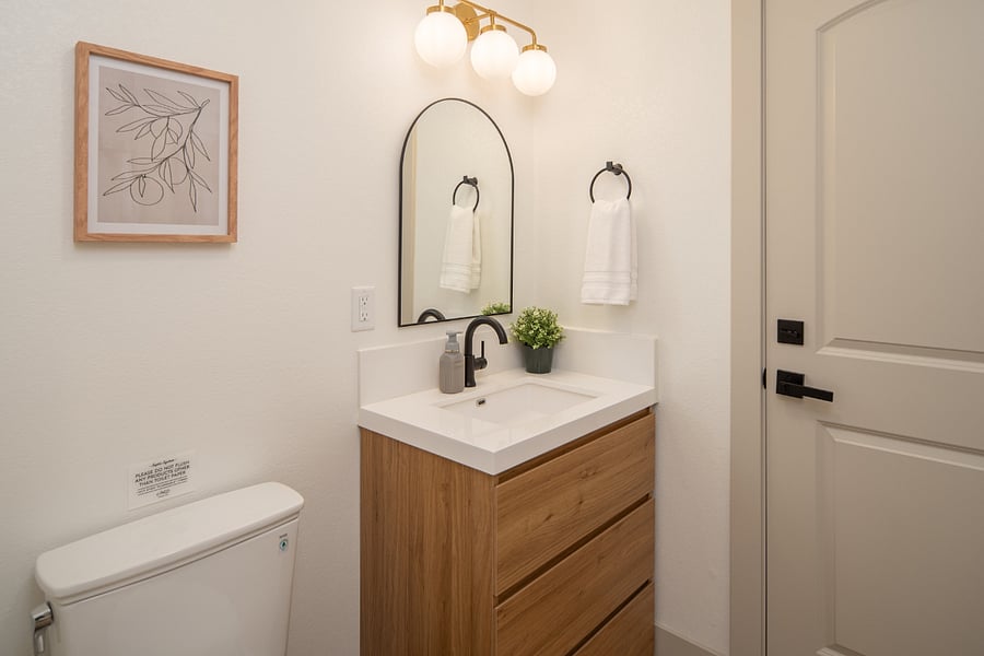 Powder room off of family room & garage/game room.