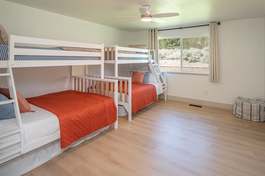 Primary suite. Currently used as a versatile bunk room, but can be converted to primary bedroom.