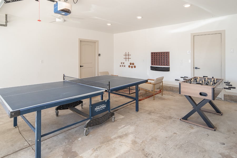 Garage/Game Room. Game equipment can be repositioned for vehicle parking as needed.