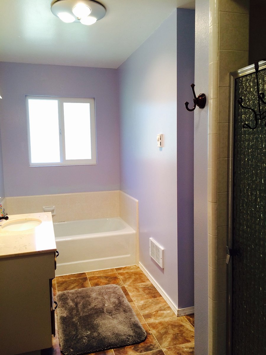 2nd Bathroom in hallway with separate shower and full size tub.