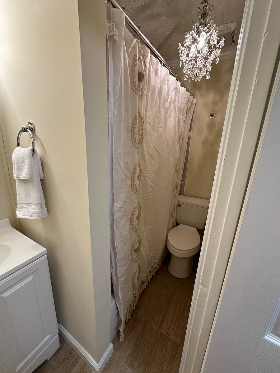 European style bathroom. You have a full size tub for your tired legs.