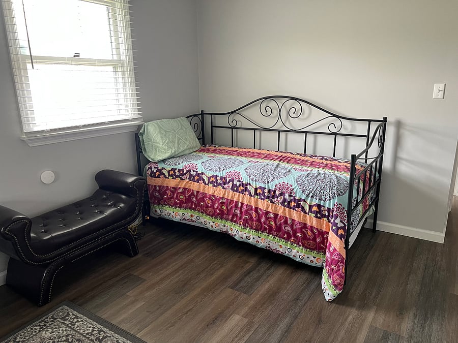 Main bedroom with queen bed and pull-out day bed