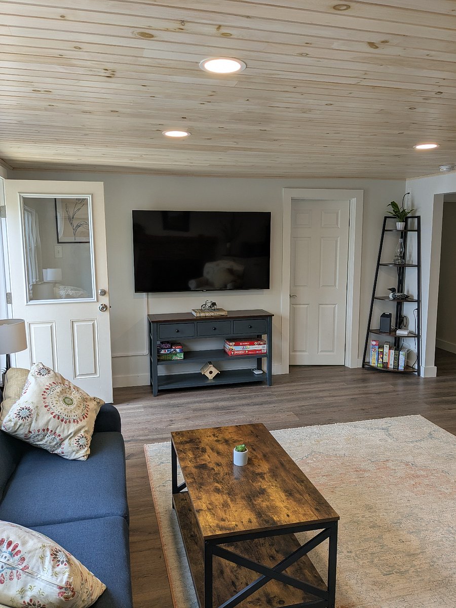 Living includes a couch, armchair, and a new 65" smart TV which you can use your own accounts for Netflix, HBO, AppleTV, etc. 
