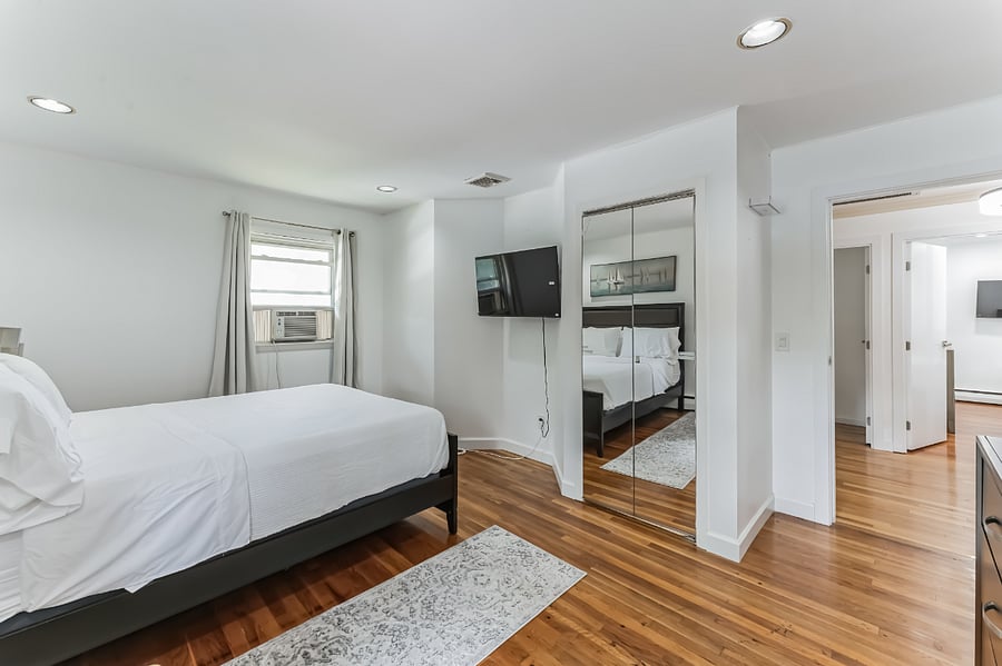 Master bedroom with queens bed