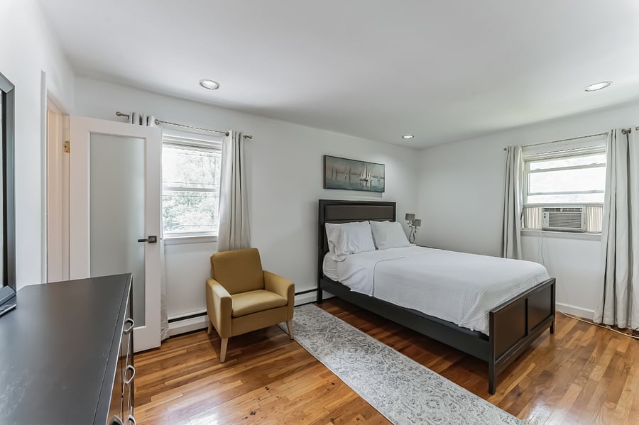 Master bedroom with queens bed