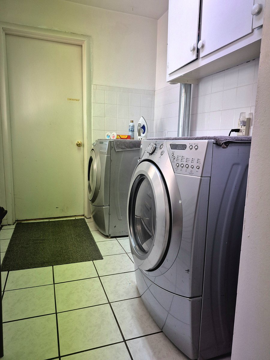 Full-sized washer and dryer.