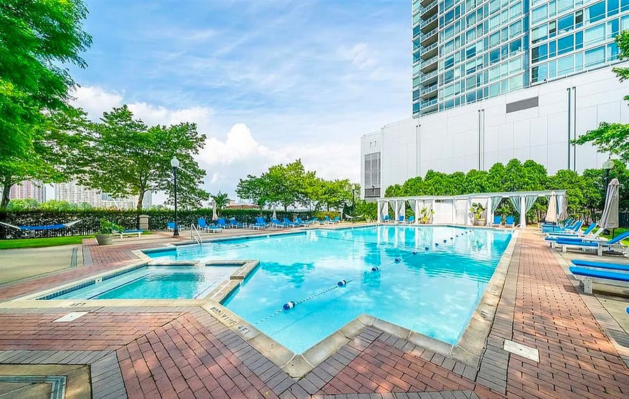 Large heated pool with cabanas
