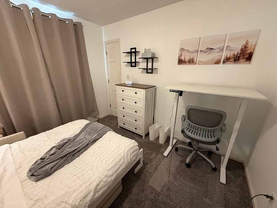 Height adjustable sit-stand desk.