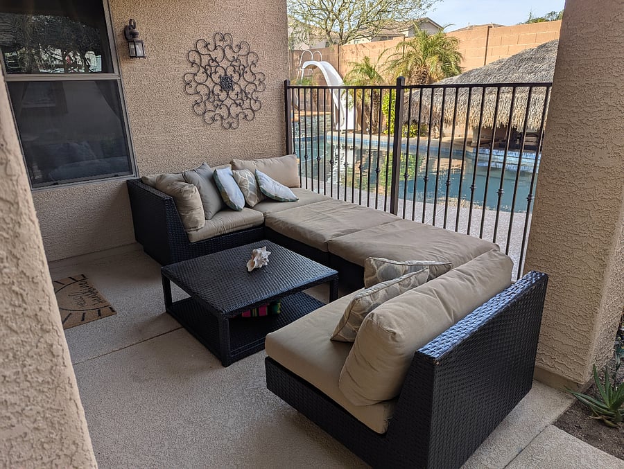 backyard has BBQ, fire pit, wood fired pizza oven, and seating .