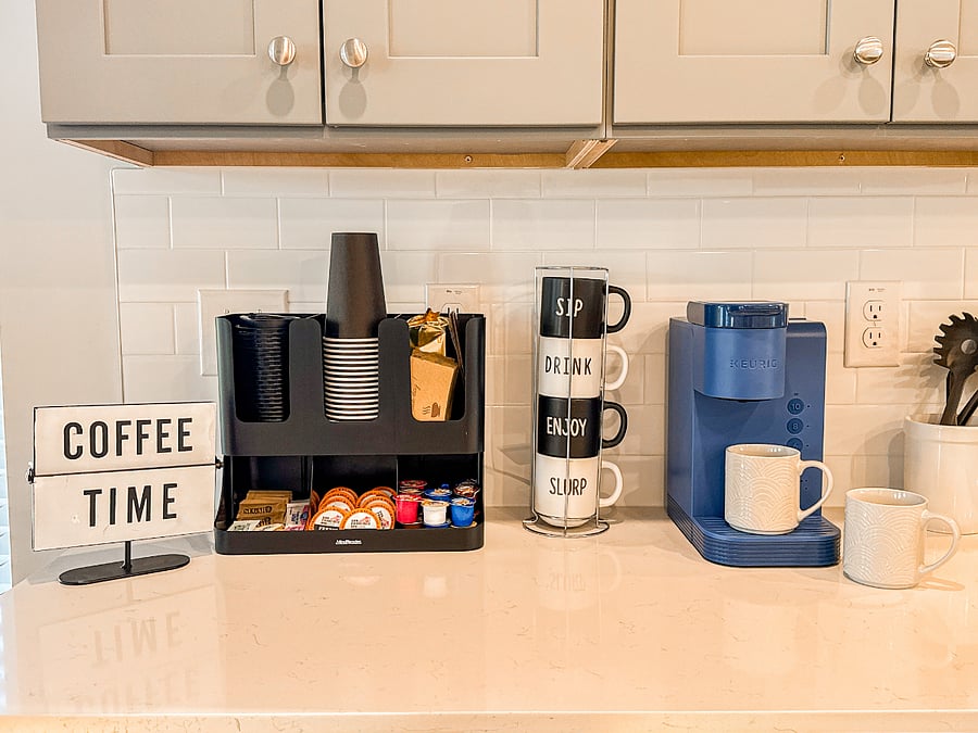 Enjoy the convenience of a Keurig coffee maker with a selection of coffee, tea, sugar, and creamer provided.
