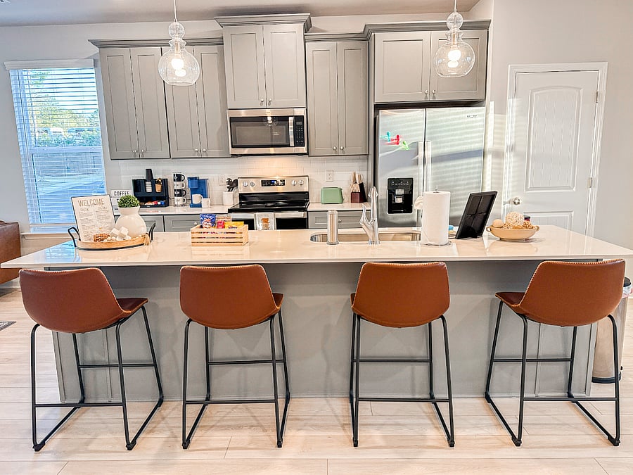 Cook up a feast in this modern kitchen with stainless steel appliances, ample counter space, and all the essentials you need for a home-cooked meal.
