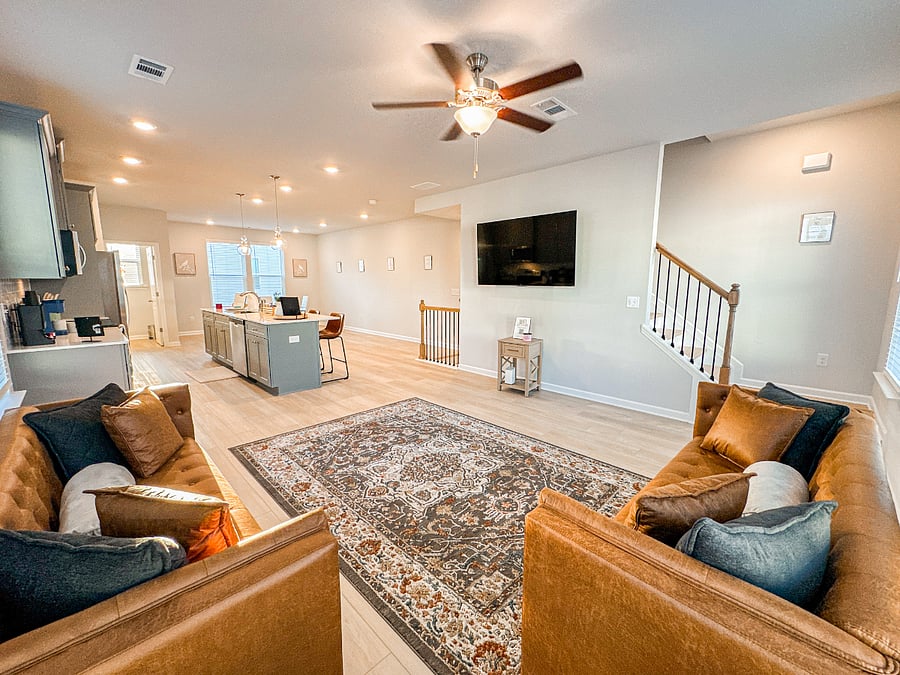 Our living room features a comfy sofa, smart TV, and large windows that let in plenty of sunshine. Perfect for unwinding after a day of exploring!
