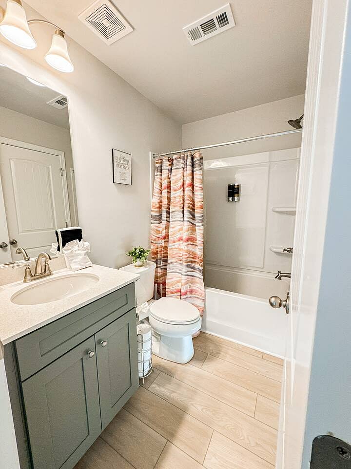 This convenient full bathroom, featuring a tub/shower combination, is located on the first floor and attached to Bedroom 4.
