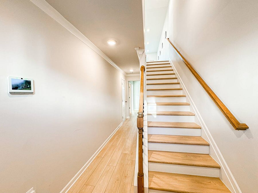 From the entry level, easily access the main living area via a set of stairs.
