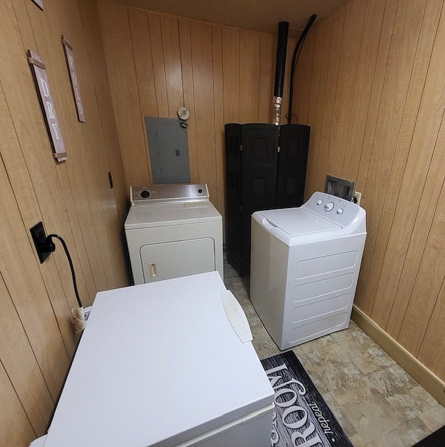 Laundry room with a full size washer and dryer