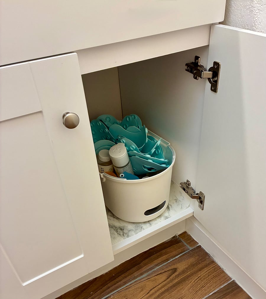 Optional kid accessories buddled under the sink