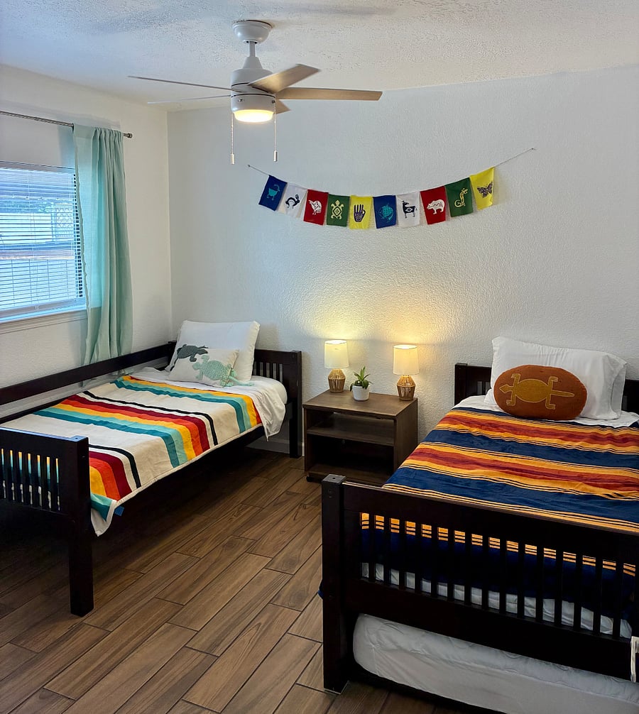 Two twin beds with optional 3rd trundle bed