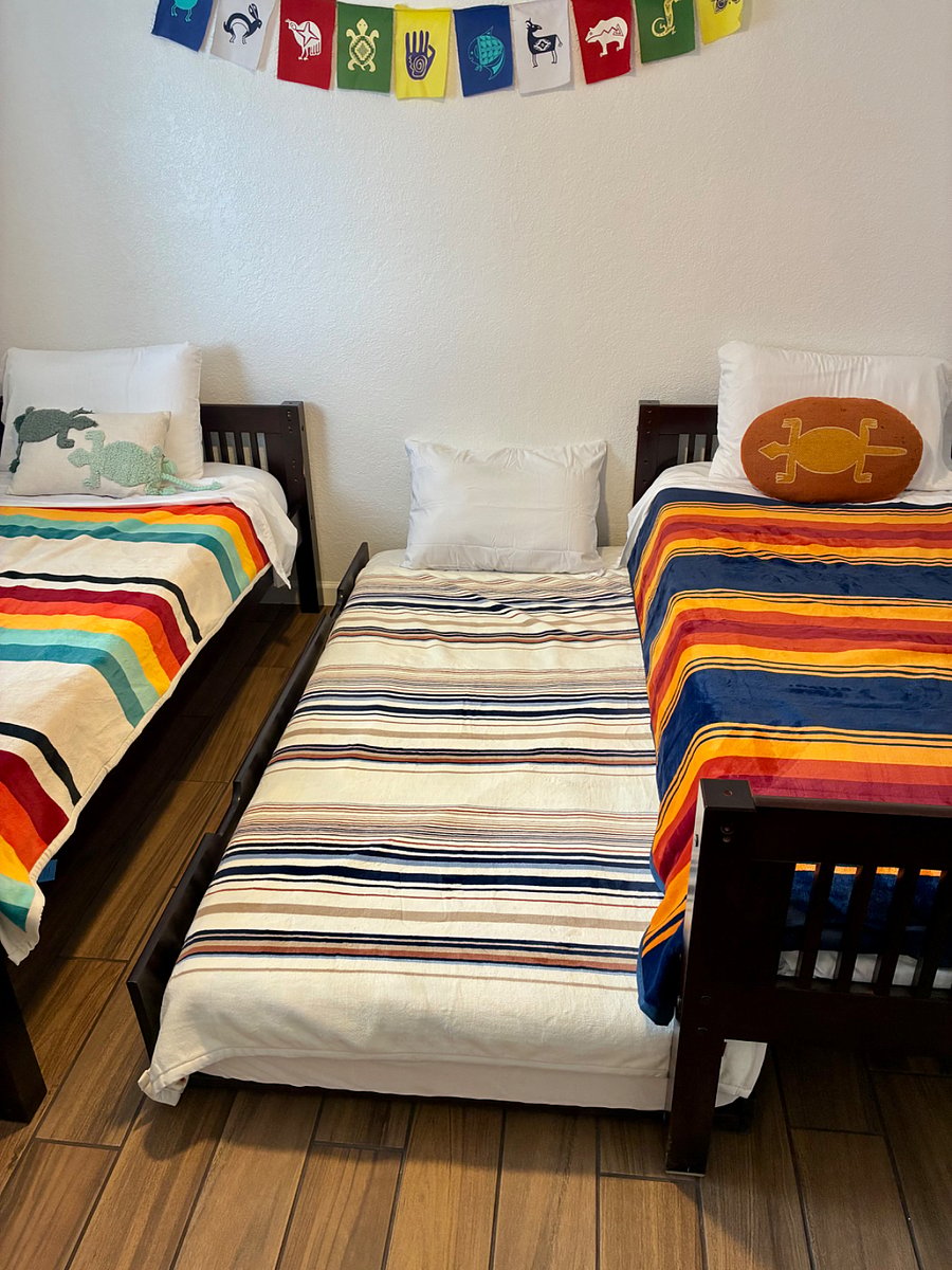 Two twin beds with optional 3rd trundle bed (pulled out)