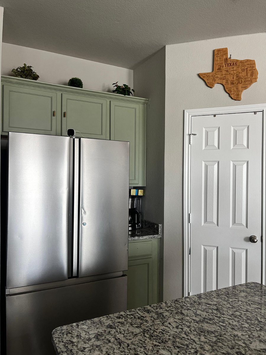 Stainless steel full fridge and walk in pantry