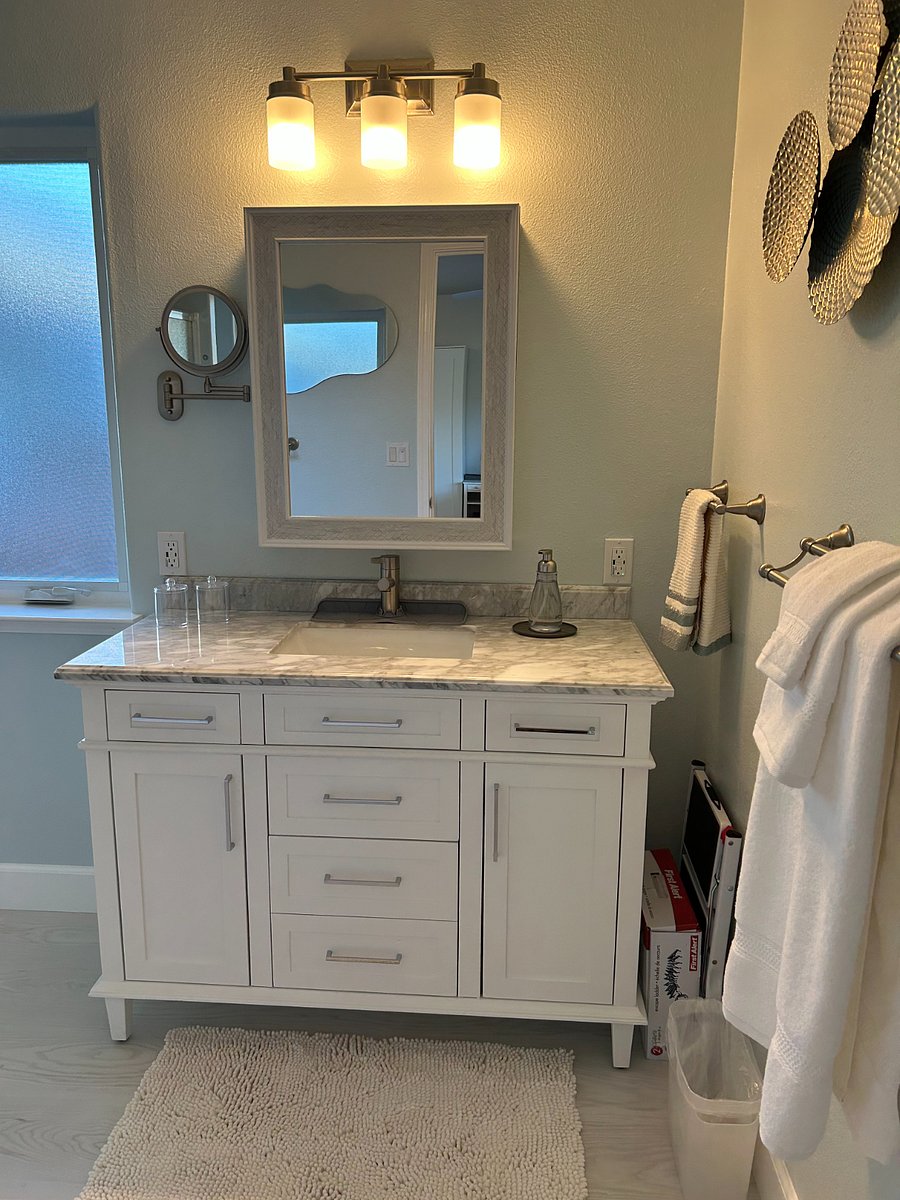 Beautiful Marble Countertop, Vanity w Deep Drawers, Spacious Cabinet w Organizers, Lighted Mirror w Magnification
