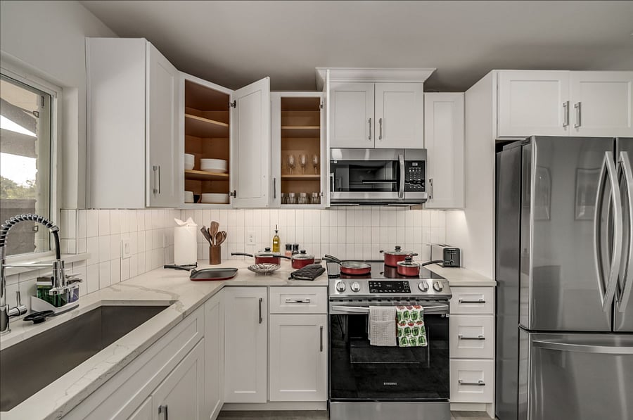 Fully stocked kitchen with all utensils, pots & pans, plates and cups. Full size appliances.