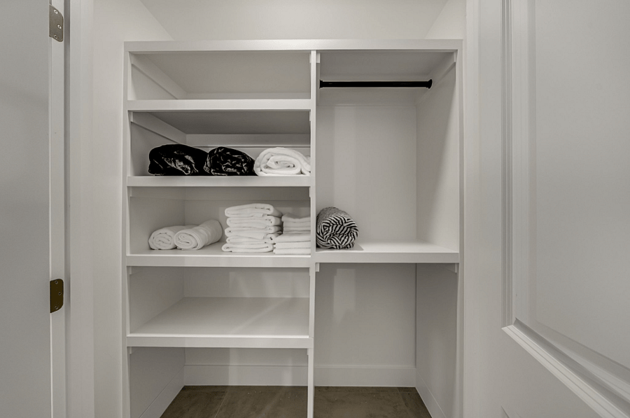 Extra storage closet off of the main hallway perfect to store luggage and winter jackets.