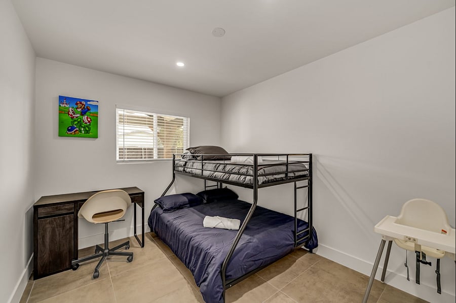 Extra room/Office right off the kitchen and dining room with a bunk bed for the little ones. full size on the bottom and twin on top.